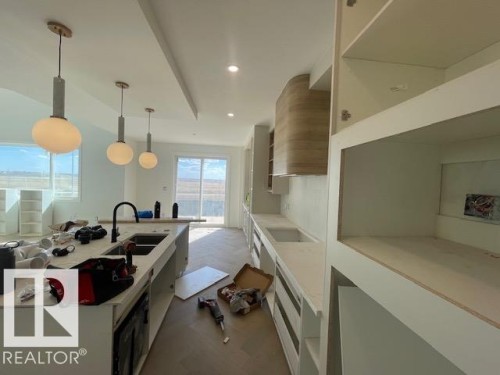 22 Owl Ridge Close, Fort Saskatchewan, AB - Indoor Photo Showing Kitchen With Upgraded Kitchen