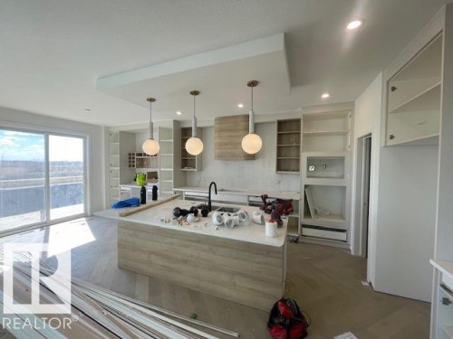22 Owl Ridge Close, Fort Saskatchewan, AB - Indoor Photo Showing Kitchen With Upgraded Kitchen