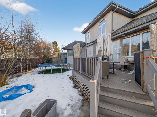 Snow covered deck featuring a trampoline - 1062 Tory Road, Edmonton, AB - Outdoor With Deck Patio Veranda With Exterior
