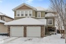 Craftsman-style house with stone siding and a garage - 13 Heron Link, Spruce Grove, AB  - Outdoor 