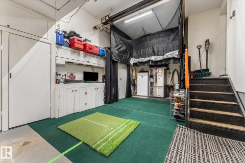 Recreation room with concrete flooring - 13 Heron Link, Spruce Grove, AB - Indoor Photo Showing Other Room
