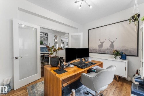 Home office featuring wood finished floors - 13 Heron Link, Spruce Grove, AB - Indoor Photo Showing Office