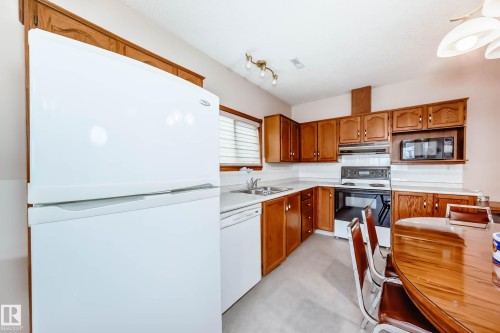 16135 56 Street, Edmonton, AB - Indoor Photo Showing Kitchen With Double Sink