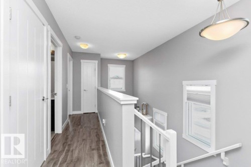 Corridor featuring an upstairs landing and light wood-type flooring - 2607 20 Avenue, Edmonton, AB - Indoor Photo Showing Other Room
