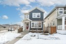 View of front of home featuring board and batten siding and a residential view - 2607 20 Avenue, Edmonton, AB  - Outdoor With Facade 