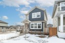 View of front of home featuring board and batten siding and a residential view - 2607 20 Avenue, Edmonton, AB  - Outdoor 