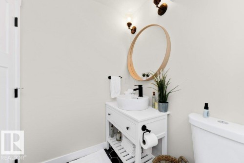 Bathroom with vanity and tile patterned flooring - 2607 20 Avenue, Edmonton, AB - Indoor Photo Showing Bathroom