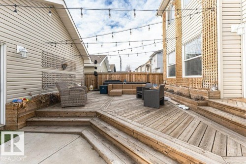 Wooden terrace with an outdoor lounge area - 2607 20 Avenue, Edmonton, AB - Outdoor With Deck Patio Veranda With Exterior