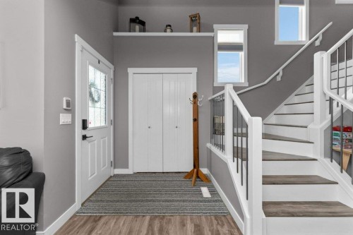 Foyer with wood finished floors and stairway - 2607 20 Avenue, Edmonton, AB - Indoor Photo Showing Other Room