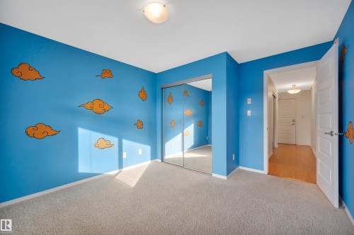 Unfurnished bedroom featuring carpet floors and a closet - 422 7909 71 Street, Edmonton, AB - Indoor Photo Showing Other Room