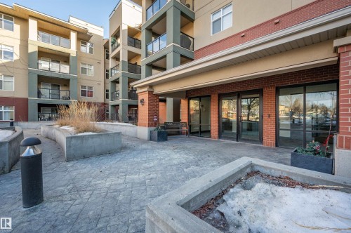 Property entrance featuring brick siding - 422 7909 71 Street, Edmonton, AB - Outdoor With Balcony
