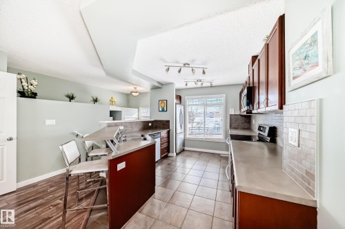 4 1804 70 Street, Edmonton, AB - Indoor Photo Showing Kitchen With Double Sink