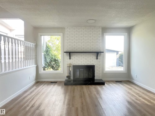 16307 112 Street, Edmonton, AB - Indoor Photo Showing Living Room With Fireplace