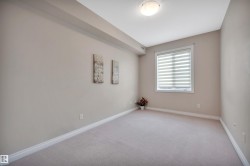 Carpeted bedroom with baseboards - 