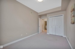 Unfurnished bedroom featuring carpet floors and a closet - 
