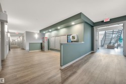 Common area featuring stairs and recessed lighting - 