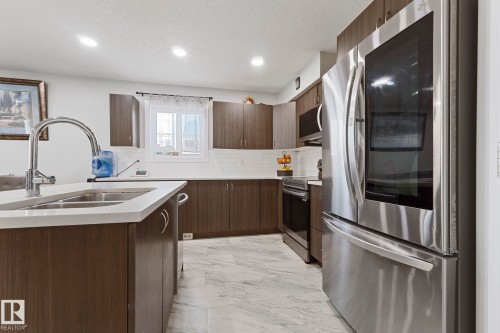 8955 150 Street, Edmonton, AB - Indoor Photo Showing Kitchen With Stainless Steel Kitchen With Double Sink