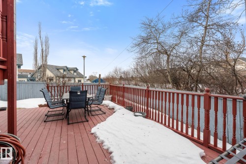 Snow covered deck with outdoor dining space and grilling area - 13148 151 Avenue, Edmonton, AB - Outdoor With Deck Patio Veranda With Exterior