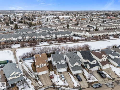 Snowy aerial view featuring a residential view - 13148 151 Avenue, Edmonton, AB - Outdoor With View