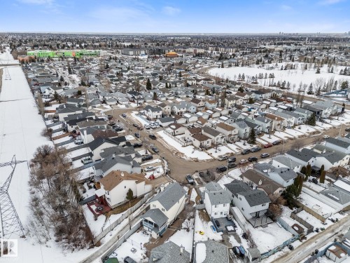 Snowy aerial view with a residential view - 13148 151 Avenue, Edmonton, AB - Outdoor With View