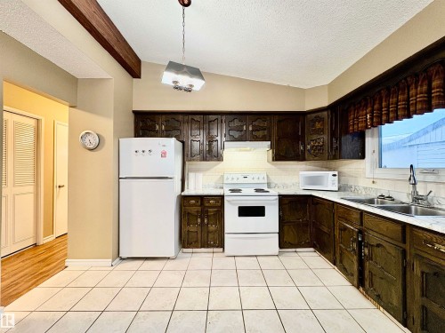 11920 45 Street, Edmonton, AB - Indoor Photo Showing Kitchen With Double Sink