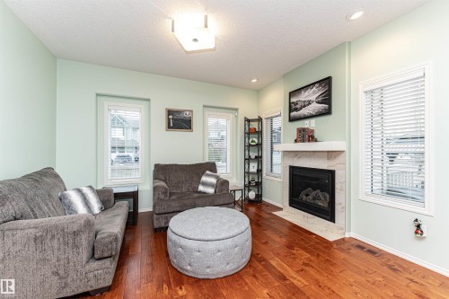 7003 174 Avenue Nw, Edmonton, AB - Indoor Photo Showing Living Room With Fireplace