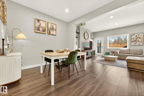 Dining room featuring dark wood-style floors and recessed lighting - 74 Royal Street, St. Albert, AB - Indoor