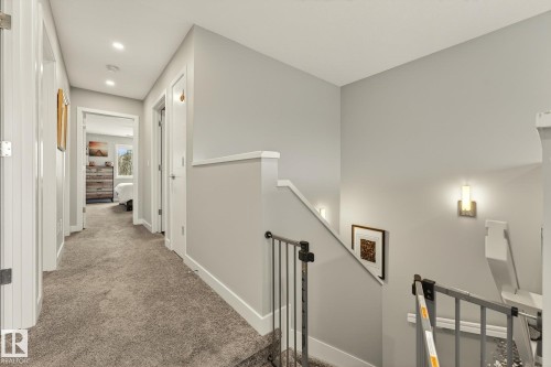 Hallway featuring an upstairs landing, carpet, and recessed lighting - 74 Royal Street, St. Albert, AB - Indoor Photo Showing Other Room
