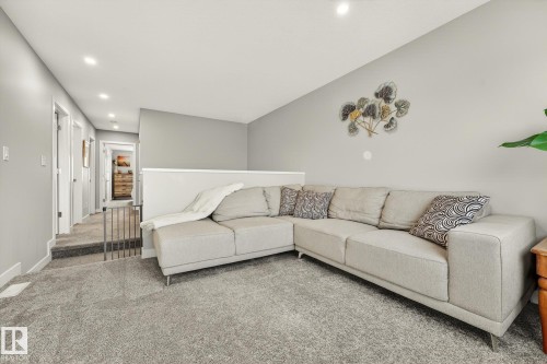 Living room featuring carpet flooring and recessed lighting - 74 Royal Street, St. Albert, AB - Indoor Photo Showing Living Room