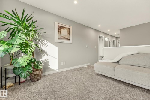 Sitting room featuring carpet and recessed lighting - 74 Royal Street, St. Albert, AB - Indoor