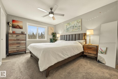 Carpeted bedroom with ceiling fan - 74 Royal Street, St. Albert, AB - Indoor Photo Showing Bedroom