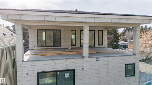 Back of property with concrete block siding - 12306 39 Avenue, Edmonton, AB - Outdoor With Exterior