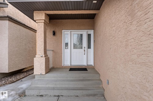 View of exterior entry featuring stucco siding - 10655 181 Avenue, Edmonton, AB - Outdoor With Exterior