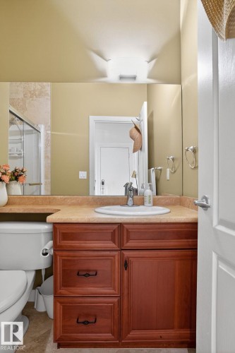 Full bath featuring vanity and a shower stall - 1 9561 143 Street Nw, Edmonton, AB - Indoor Photo Showing Bathroom