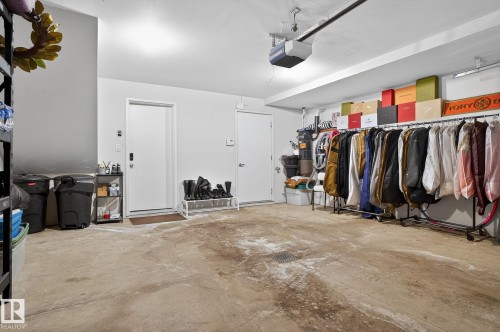 Garage featuring a garage door opener - 1 9561 143 Street Nw, Edmonton, AB - Indoor
