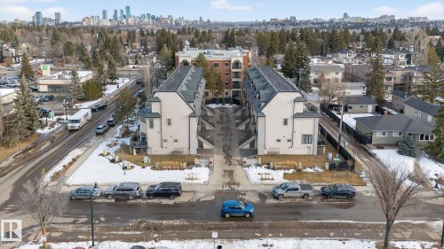 Snowy aerial view with a skyline view - 1 9561 143 Street Nw, Edmonton, AB - Outdoor With View