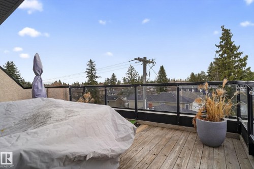 View of wooden terrace - 1 9561 143 Street Nw, Edmonton, AB - Outdoor With Deck Patio Veranda
