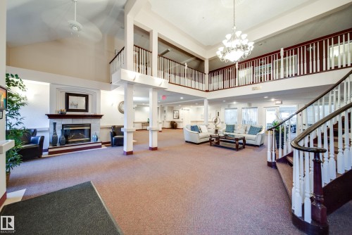 411 6703 172 Street, Edmonton, AB - Indoor Photo Showing Other Room With Fireplace