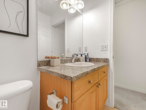 Bathroom featuring vanity and toilet - 3239 21 Street, Edmonton, AB - Indoor Photo Showing Bathroom