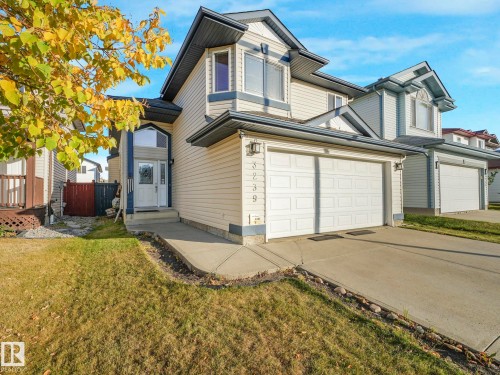 View of front of house with concrete driveway - 3239 21 Street, Edmonton, AB - Outdoor With Facade