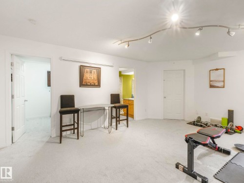 Exercise area with light colored carpet - 3239 21 Street, Edmonton, AB - Indoor