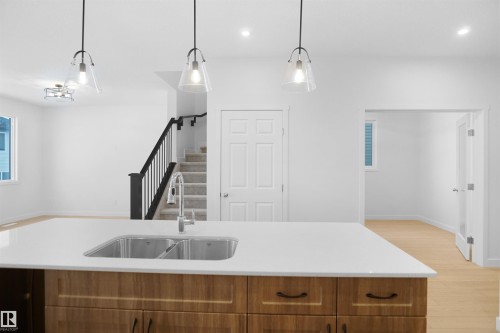 1332 11 Avenue, Edmonton, AB - Indoor Photo Showing Kitchen With Double Sink