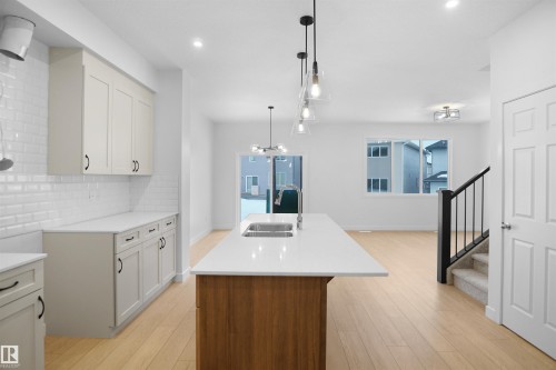 1332 11 Avenue, Edmonton, AB - Indoor Photo Showing Kitchen With Double Sink