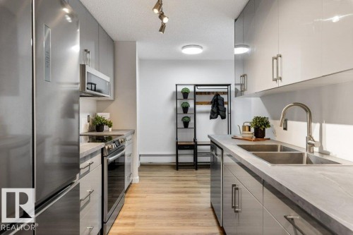 802 8220 Jasper Avenue, Edmonton, AB - Indoor Photo Showing Kitchen With Double Sink With Upgraded Kitchen