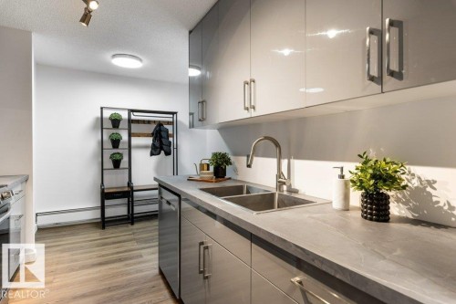 802 8220 Jasper Avenue, Edmonton, AB - Indoor Photo Showing Kitchen With Double Sink