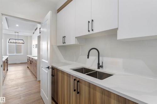 58 Meadowgrove Landing, Spruce Grove, AB - Indoor Photo Showing Kitchen With Double Sink