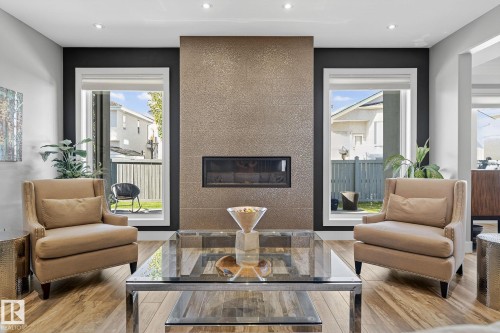 4810 Donsdale Drive, Edmonton, AB - Indoor Photo Showing Living Room With Fireplace