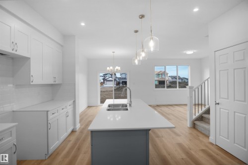 4 Ellis Link, Spruce Grove, AB - Indoor Photo Showing Kitchen With Double Sink With Upgraded Kitchen