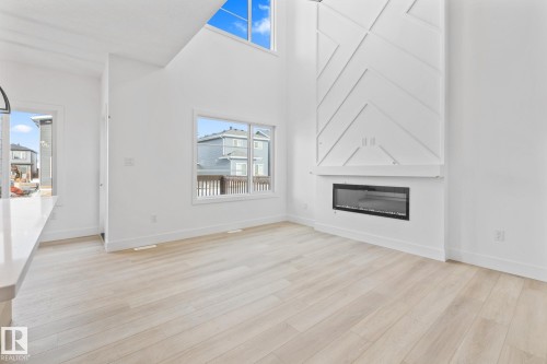 26 Blackbird Bend, Fort Saskatchewan, AB - Indoor Photo Showing Other Room With Fireplace
