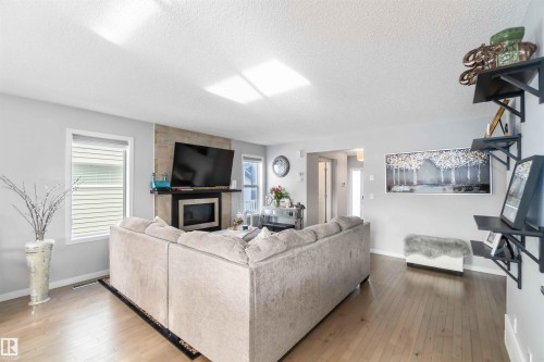 6319 167A Avenue, Edmonton, AB - Indoor Photo Showing Living Room With Fireplace
